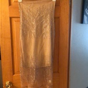 Beautiful strapless Gold dress still has tags on it never worn